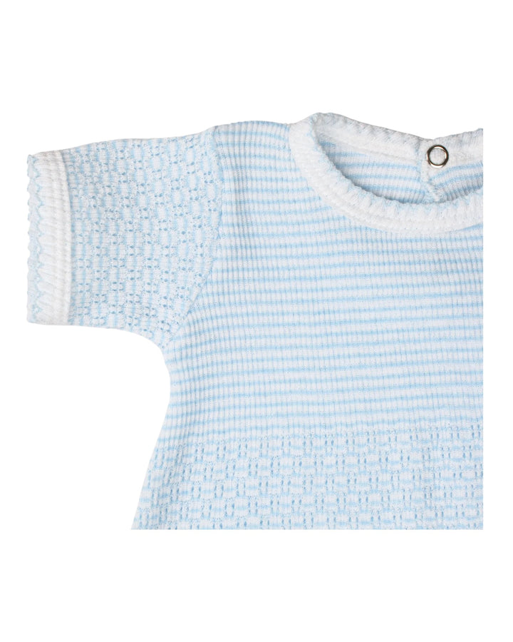 Baby t-shirt with blue and white pattern on a white background
