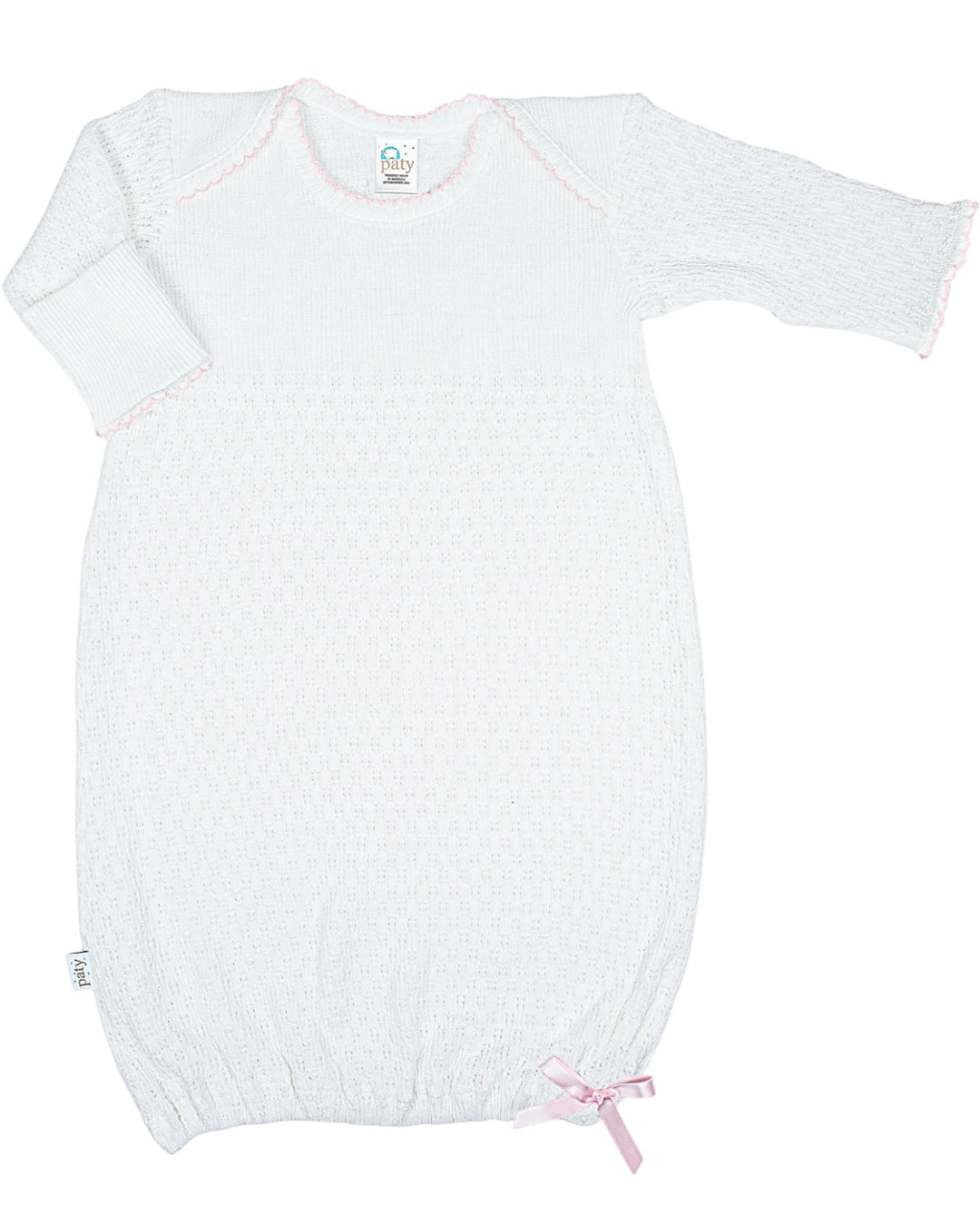 White baby romper with pink bow on a white background