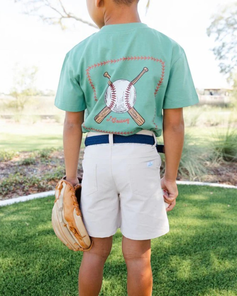 boy in a performance kahki shorts, that store