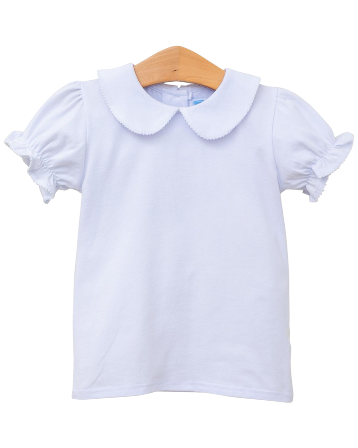 White blouse with ruffled sleeves and collar on a white background