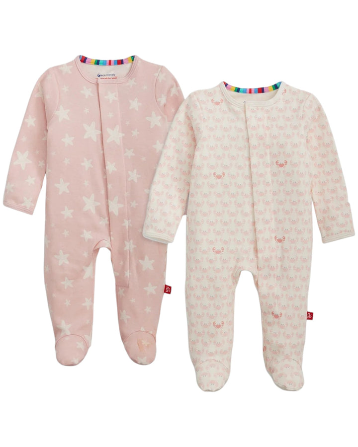Two baby onesies with star patterns on a white background
