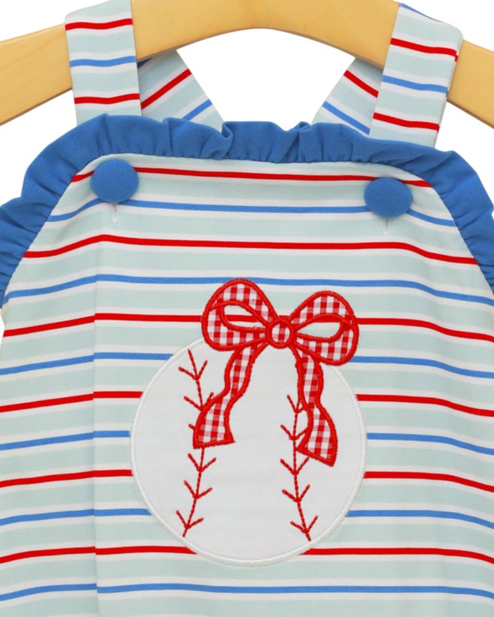 Striped baby romper with a bow design on a hanger