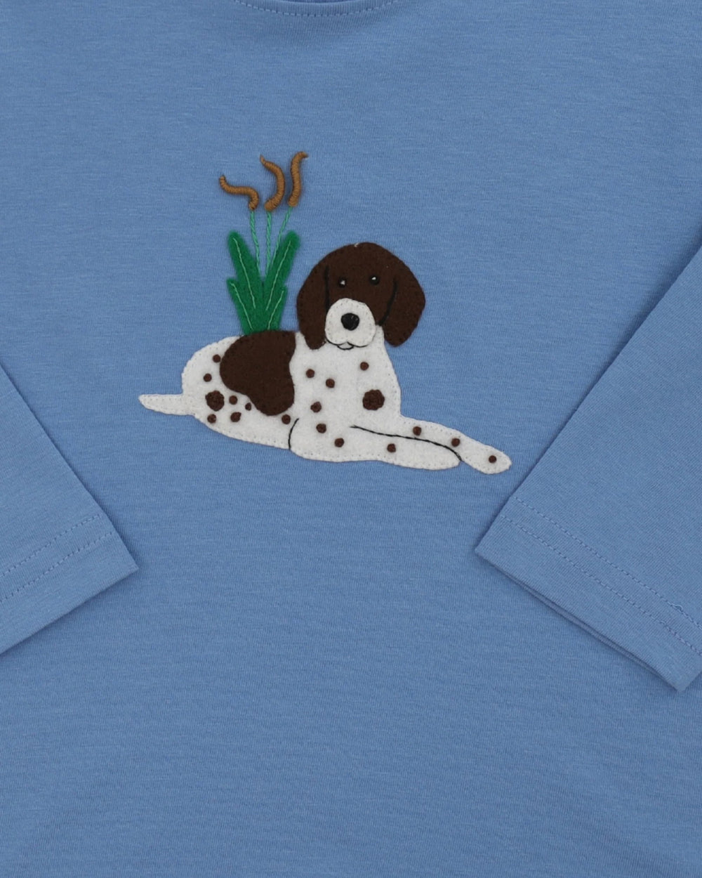 dog applique on a blue long sleeve tee, that store