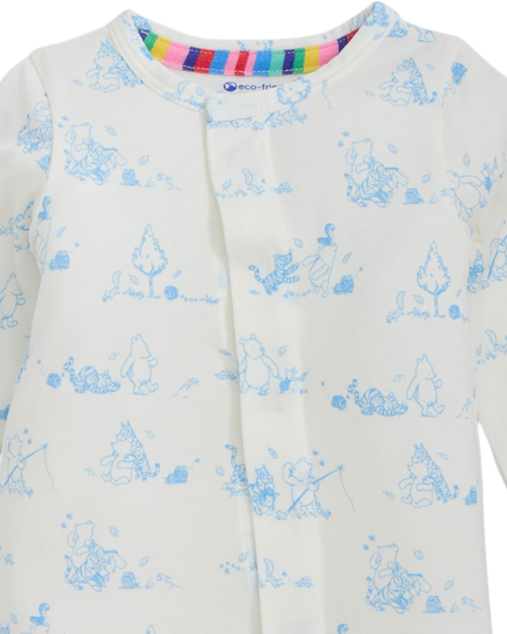 Baby onesie with blue bear pattern and rainbow trim on a white background