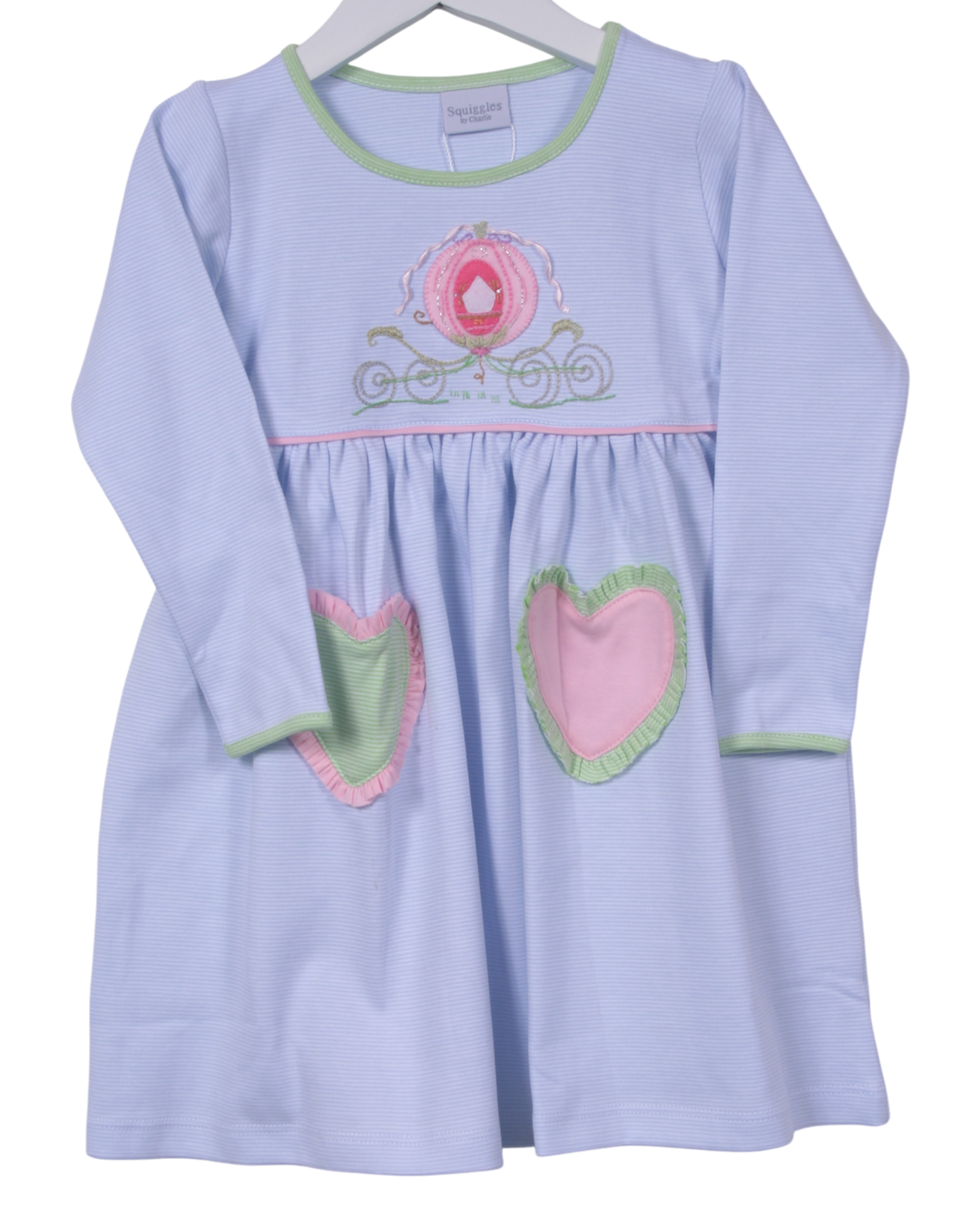 Light blue dress with pink heart design on a white background