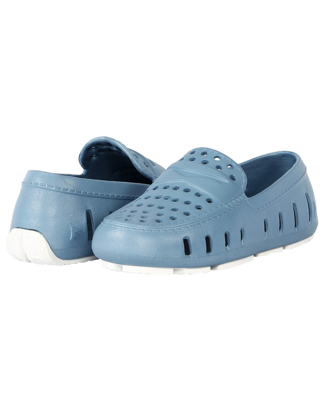 Pair of blue clogs on a white background