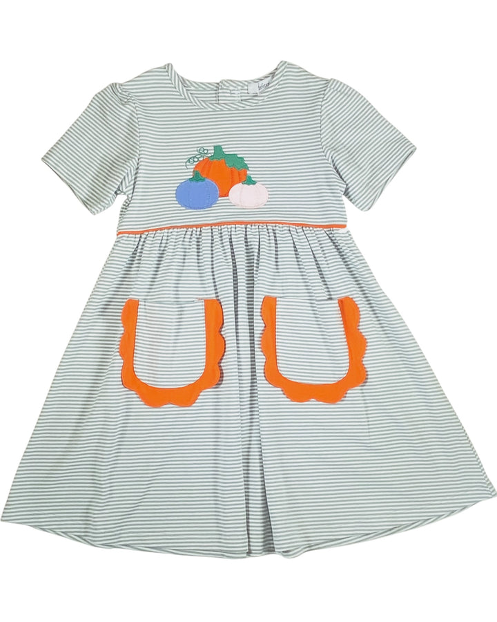 Striped dress with pumpkin and ghost appliqués on a white background