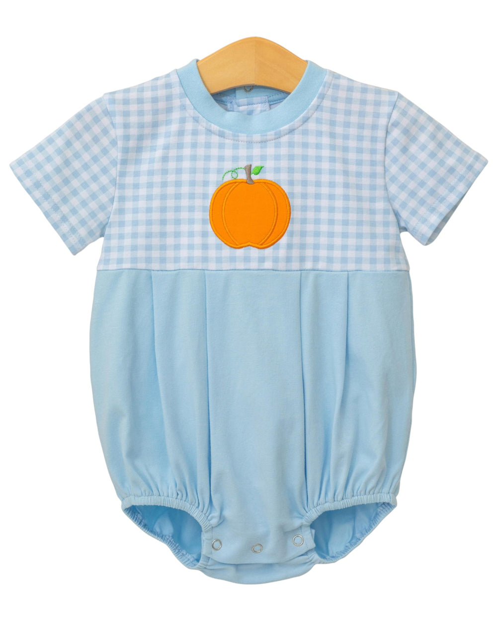 Baby romper with blue checkered pattern and orange pumpkin design on a white background