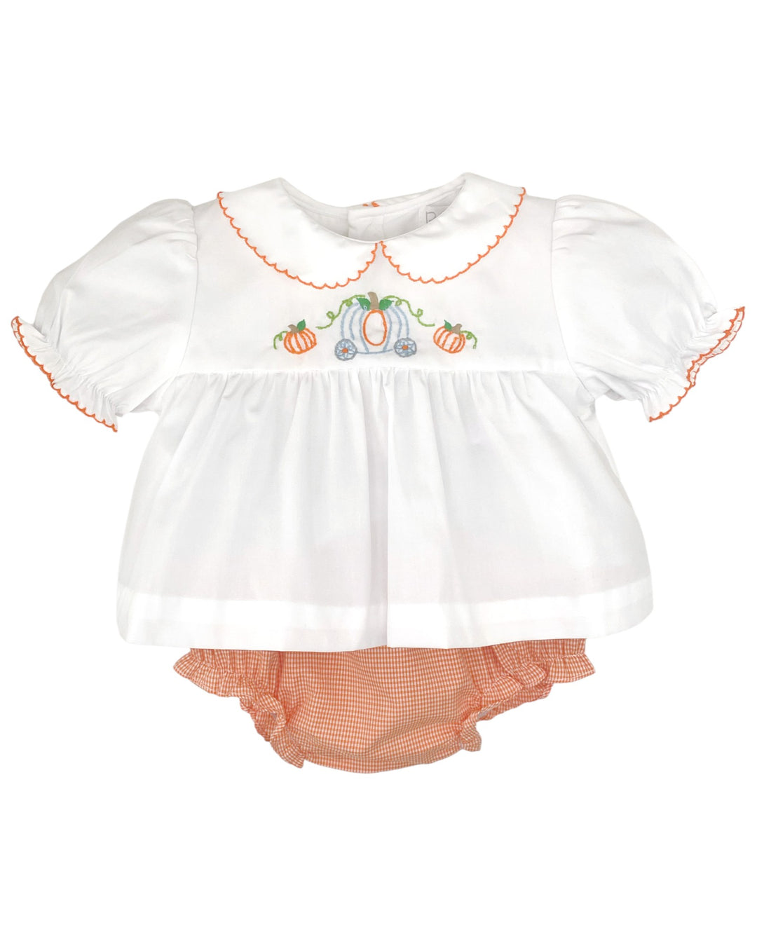 Baby girl's outfit with white top and orange bloomers on a white background
