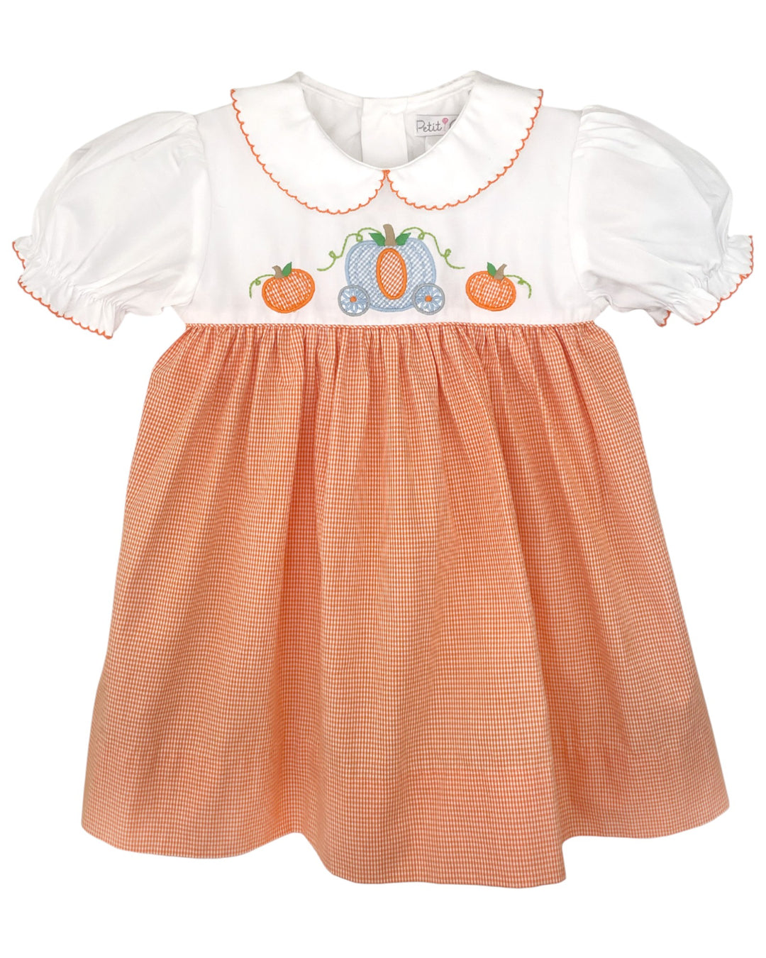 Children's dress with white top and orange checkered skirt on a white background