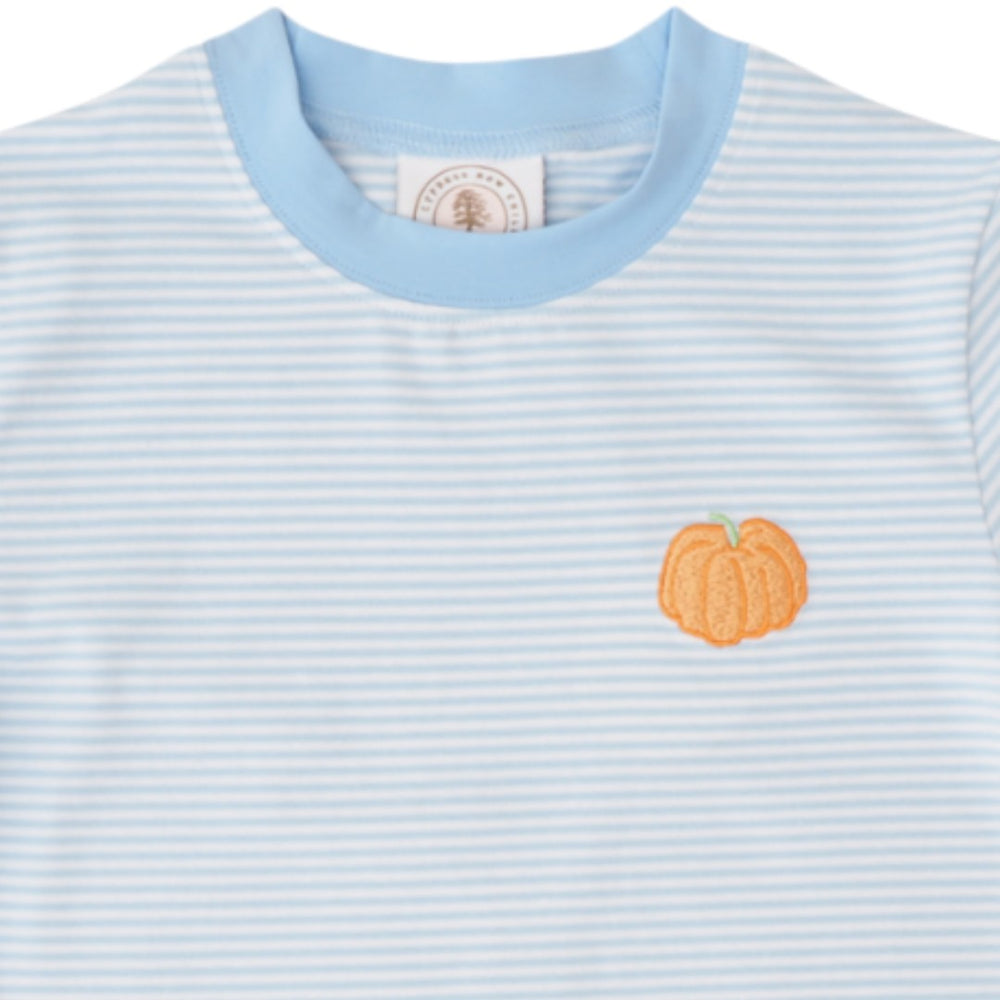 A light blue and white striped short-sleeve t-shirt with a light blue crew neck and a small orange pumpkin graphic on the left chest, shown on a plain white background, that store