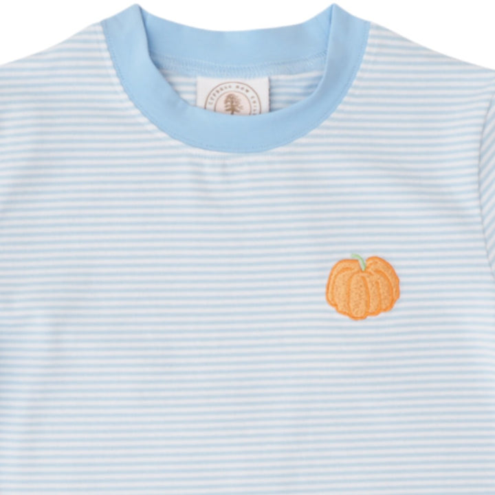 A light blue and white striped short-sleeve t-shirt with a light blue crew neck and a small orange pumpkin graphic on the left chest, shown on a plain white background, that store