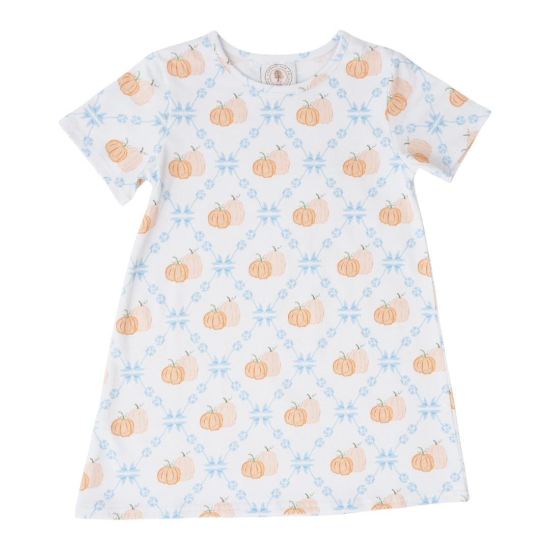 A short-sleeve white baby dress featuring an all-over autumn pattern of orange pumpkins and light blue snowflakes, displayed flat against a solid white background, that store