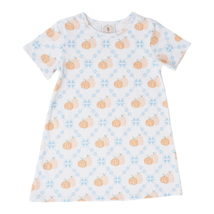 A short-sleeve white baby dress featuring an all-over autumn pattern of orange pumpkins and light blue snowflakes, displayed flat against a solid white background, that store