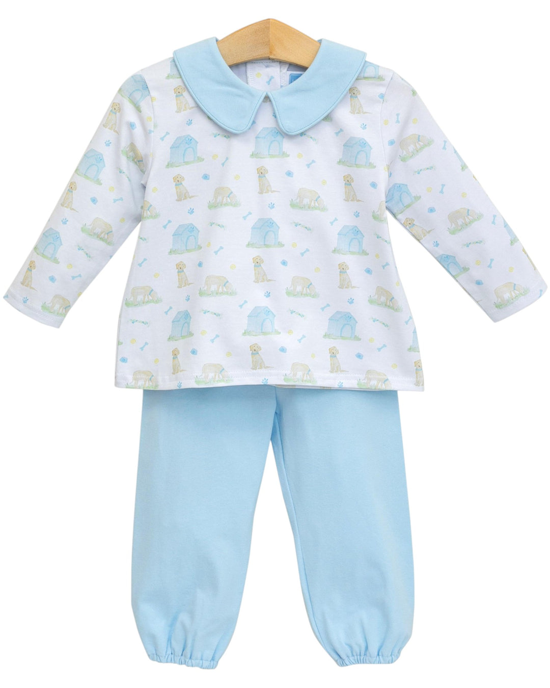 Children's outfit with a patterned shirt and light blue pants on a white background