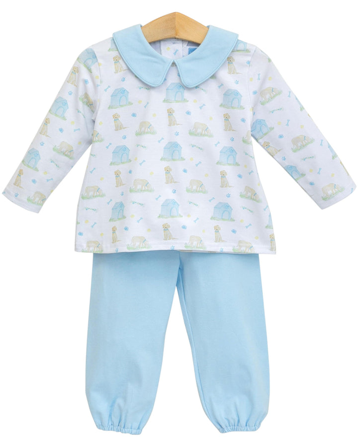 Children's outfit with a patterned shirt and light blue pants on a white background