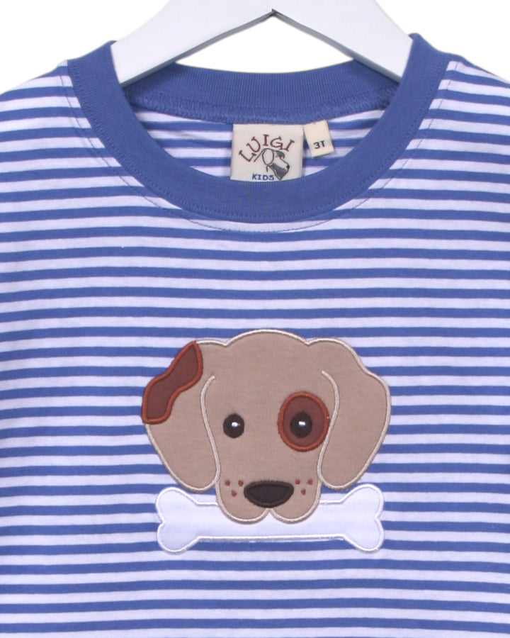 Blue and white striped shirt with a dog patch on a hanger