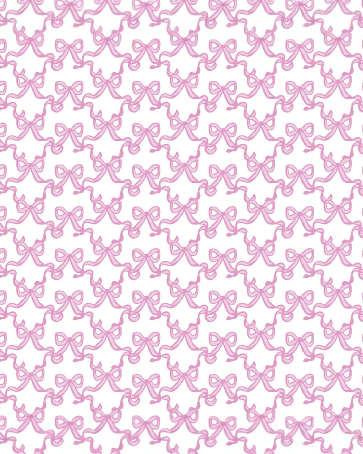 Pattern of pink bows on a white background