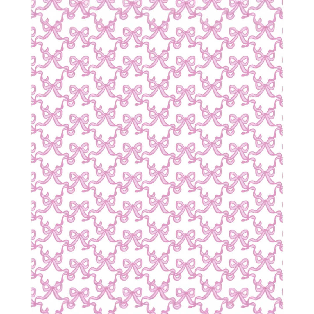 Pattern of pink bows on a white background