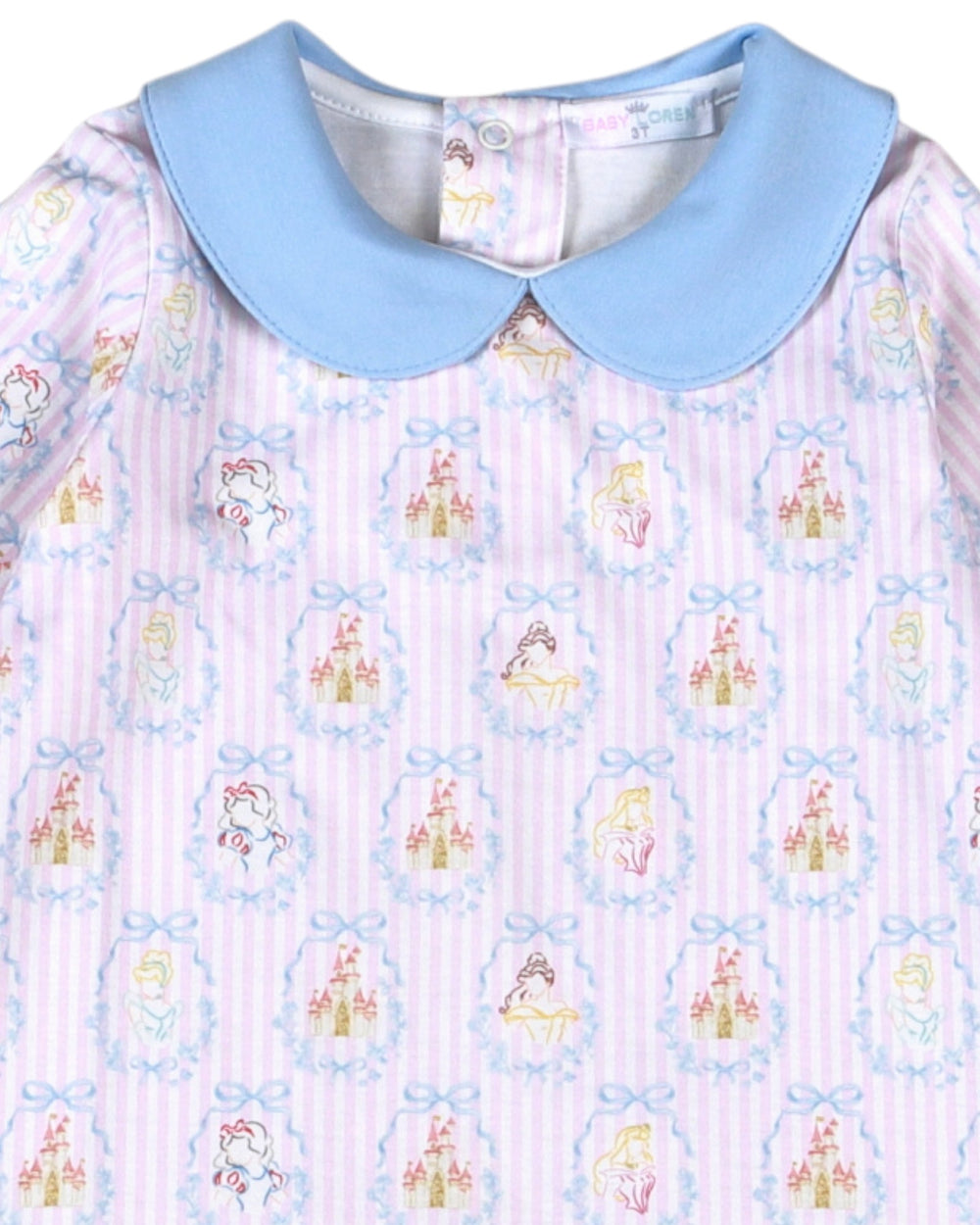 A close-up of a baby dress featuring a light blue Peter Pan collar and a pink and white striped body with a repeating pattern of colorful princess and unicorn motifs, that store