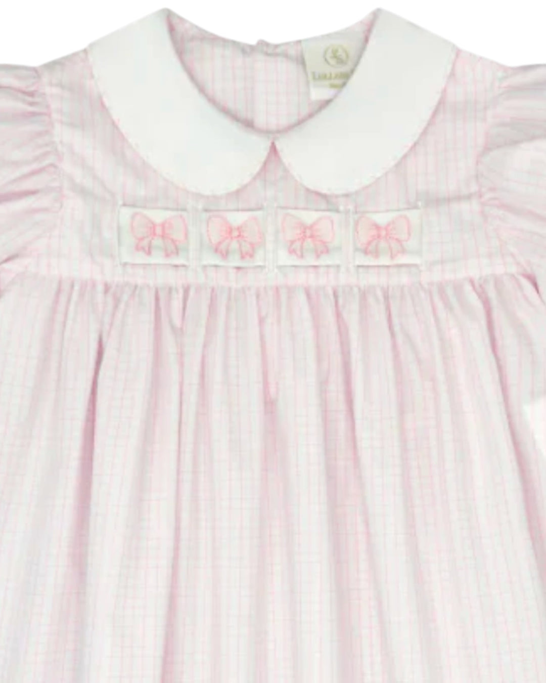 Pink and white striped dress with embroidered details on a white background
