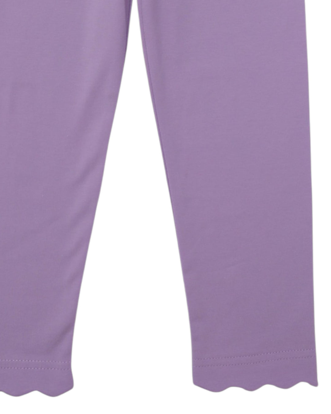 Close-up of a pair of solid lavender-purple leggings with scalloped hems, shown against a plain white background, that store
