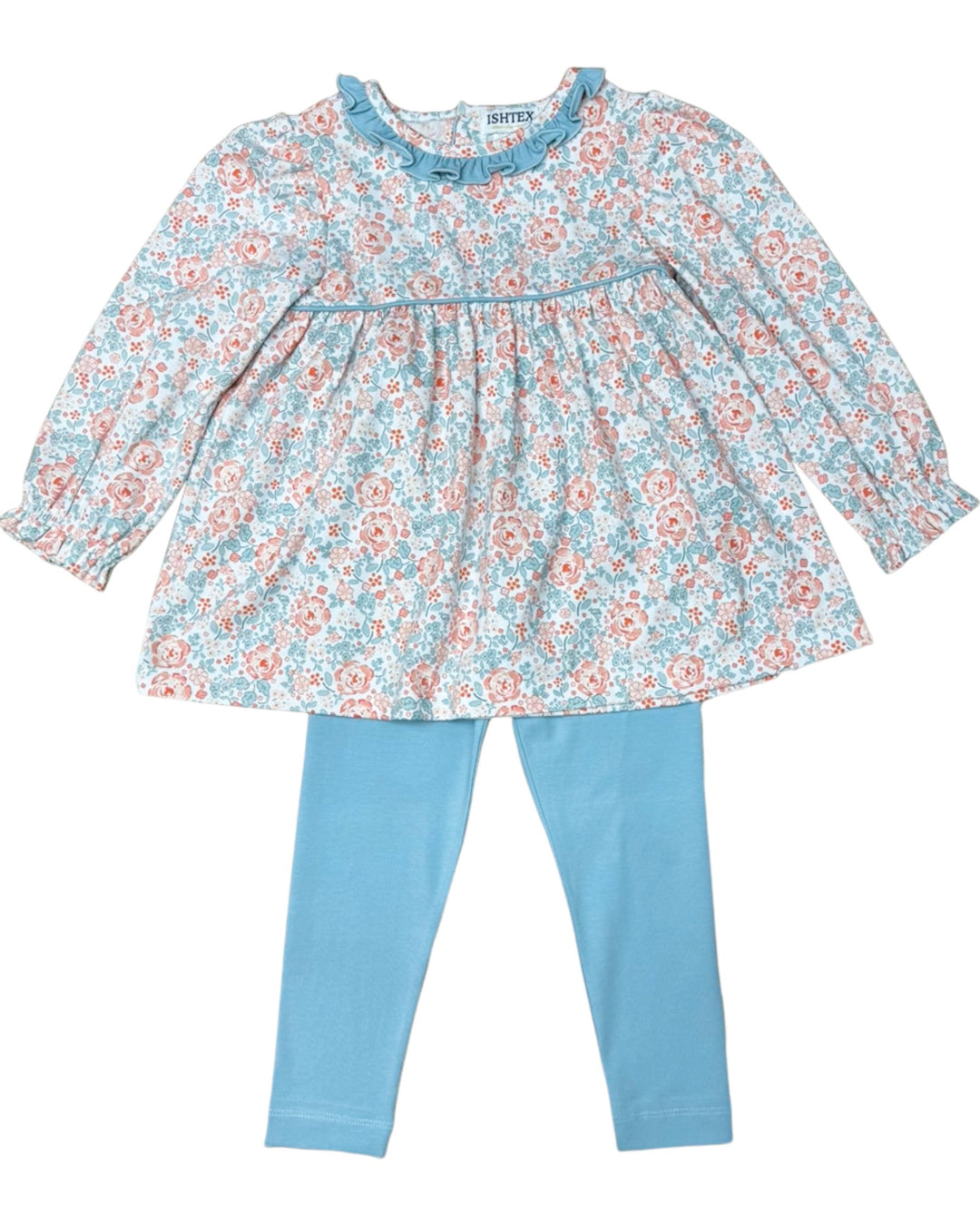 Floral top and blue leggings set on a white background