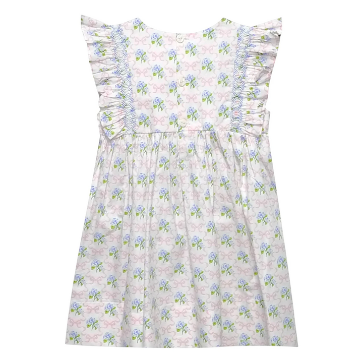 Floral dress with ruffled details on a white background