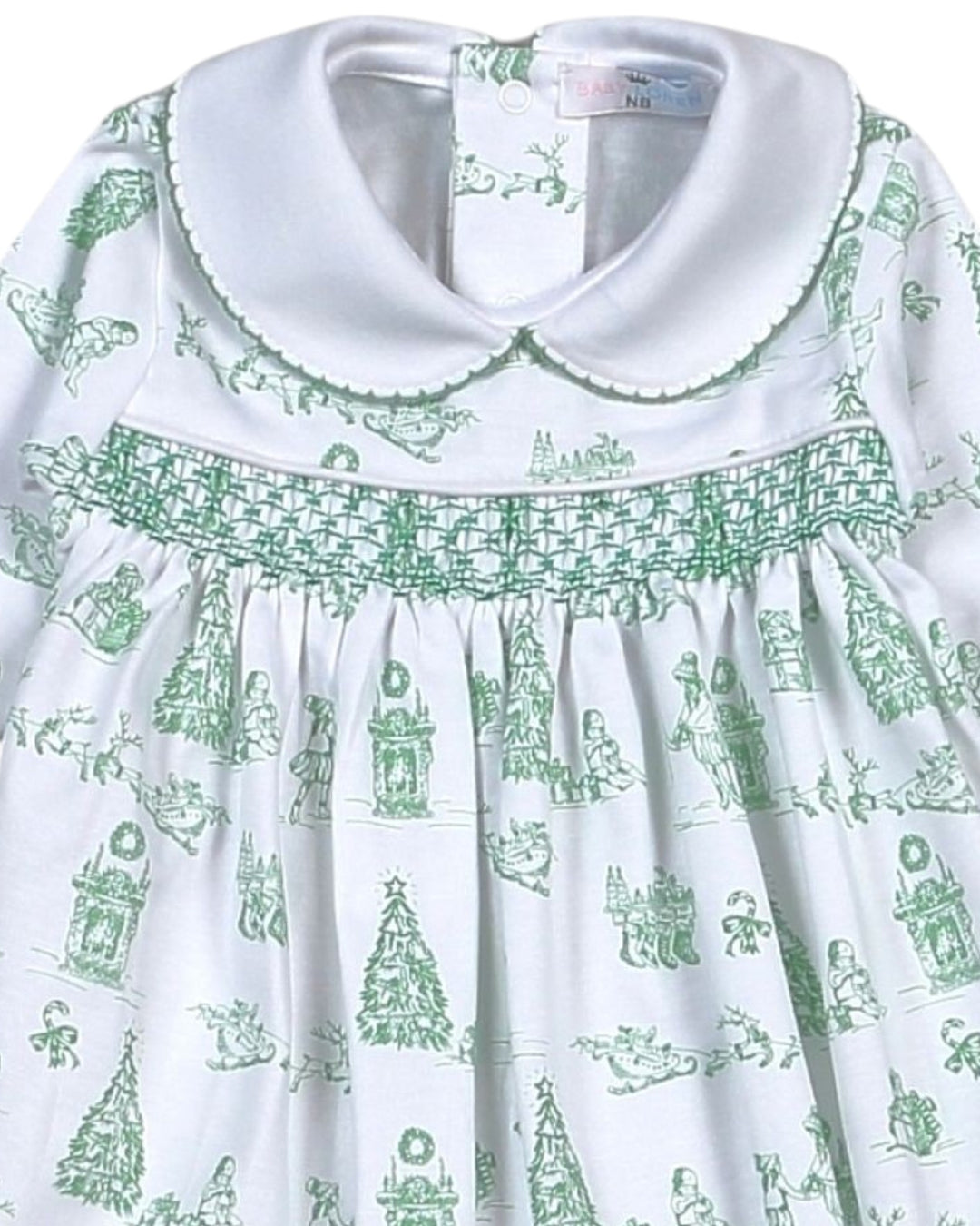 White dress with green pattern on a white background