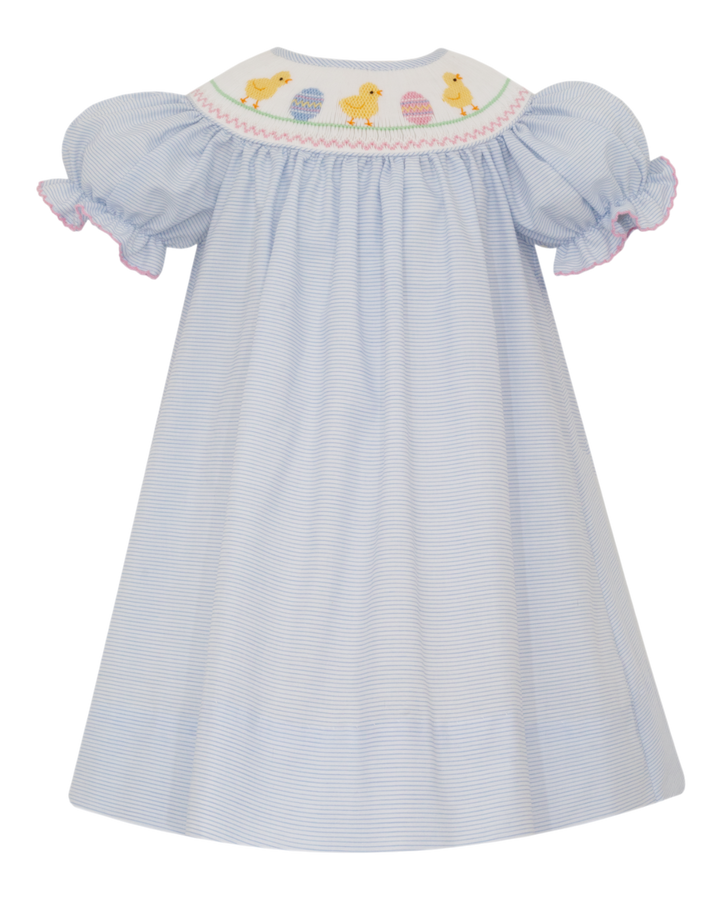 Light blue dress with smocked chicks and eggs on a white background