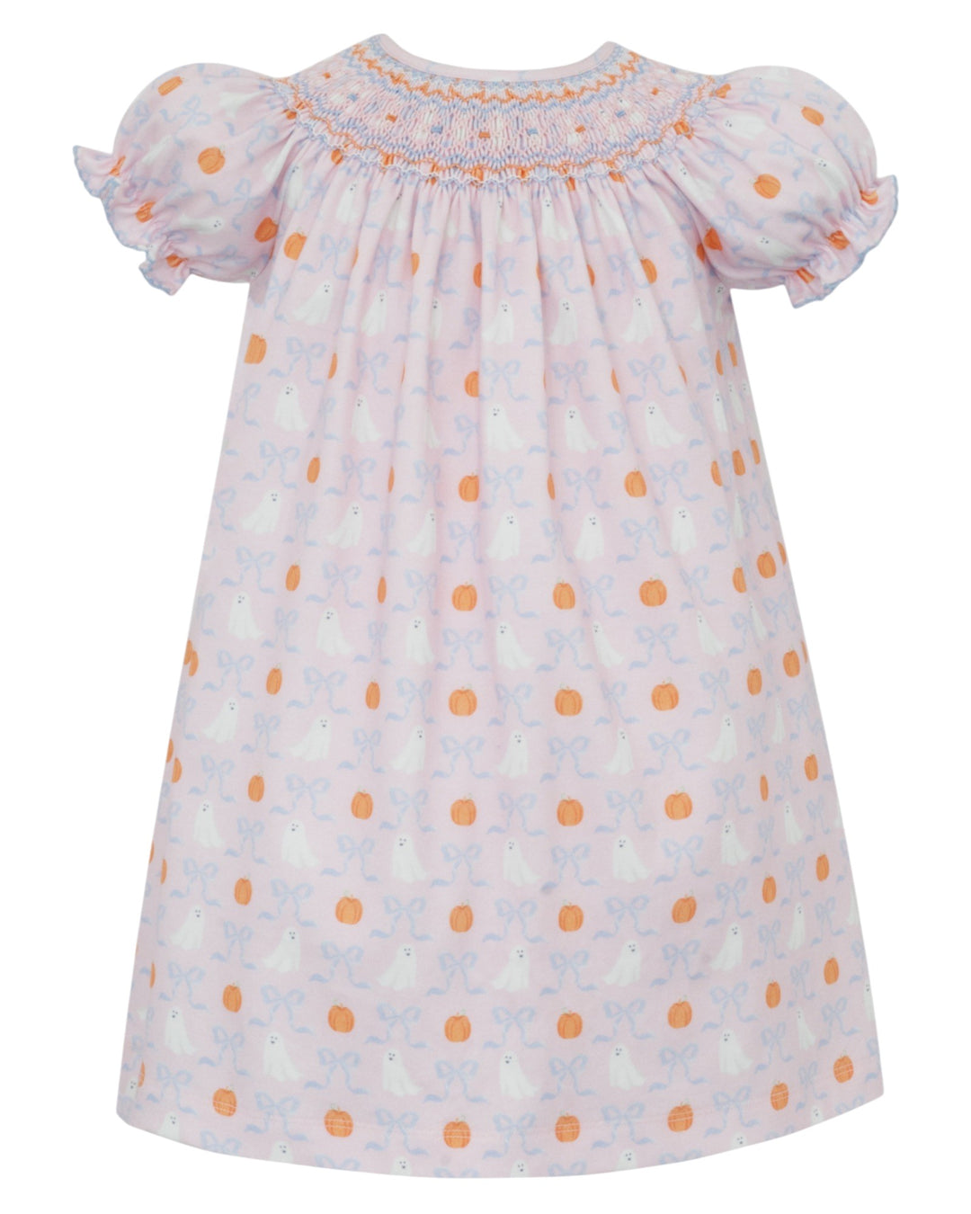 White dress with orange polka dots and floral patterns on a white background
