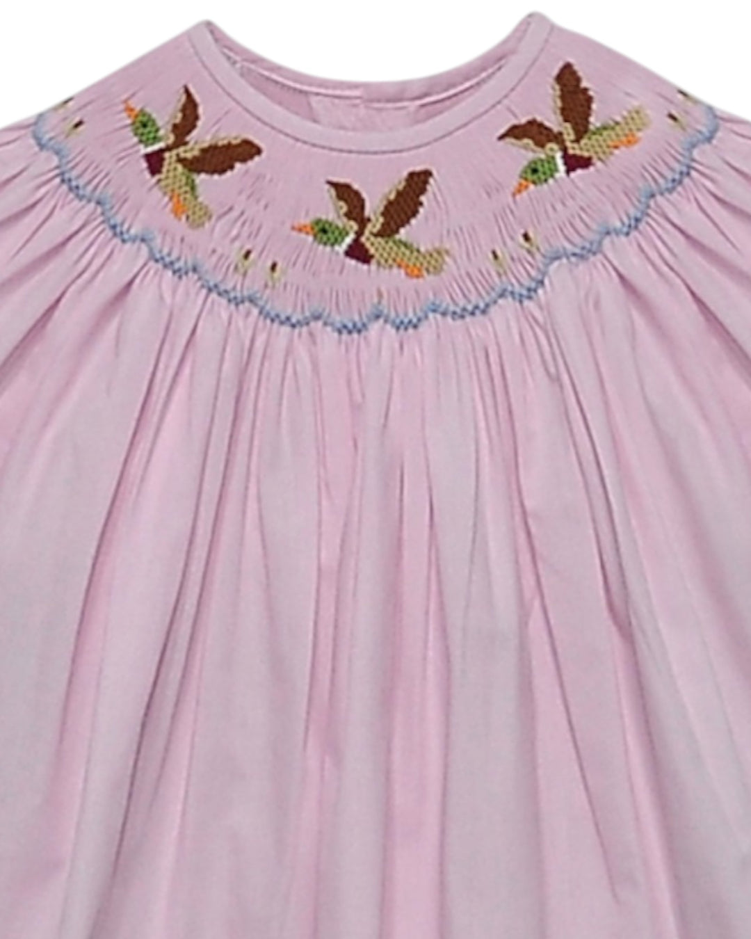 Pink dress with embroidered neckline featuring smocked mallards
