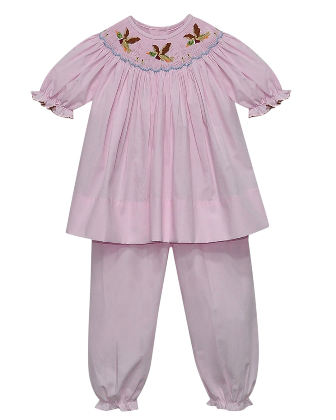 Pink children's outfit with smocked top of mallards and pants on a white background