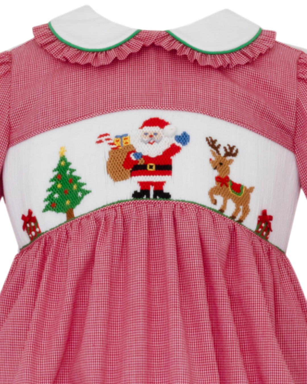 Red checkered dress with Christmas-themed embroidery featuring Santa Claus and reindeer on a white background.