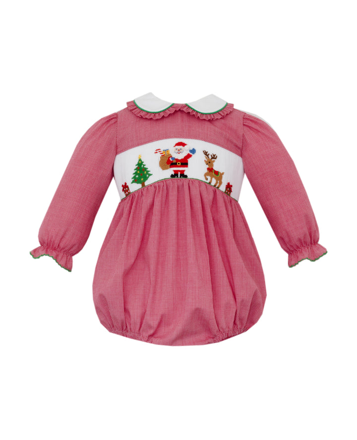 Pink baby dress with Christmas-themed embroidery on a white background