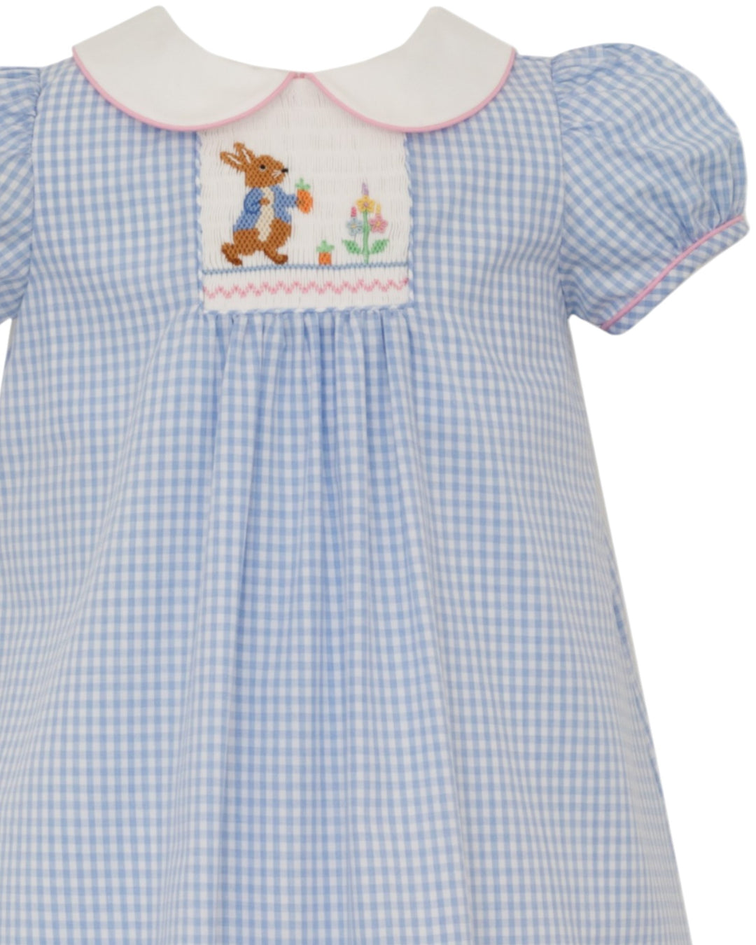 Blue checkered dress with embroidered bear design on a white background