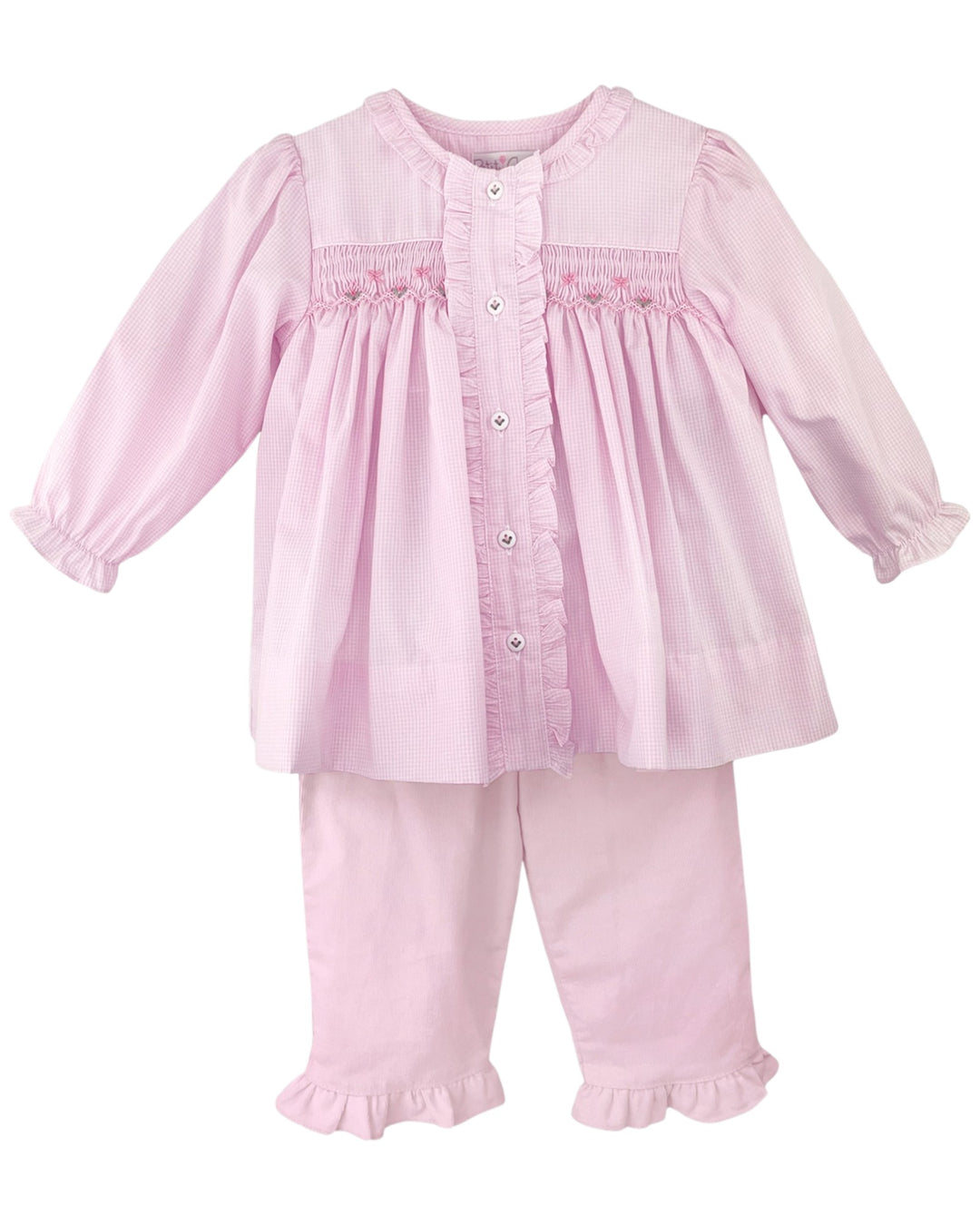 Pink baby outfit with top and pants on a white background