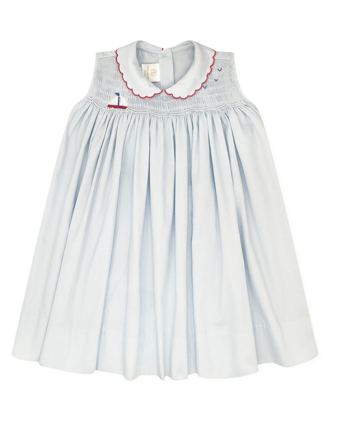 Light blue dress with red trim on a white background