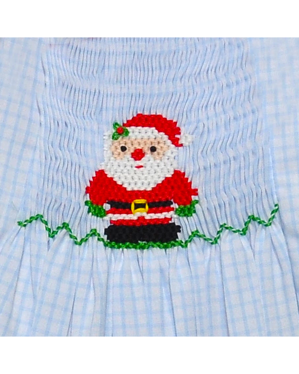 Smocked dress with a Santa Claus design on a blue checkered background