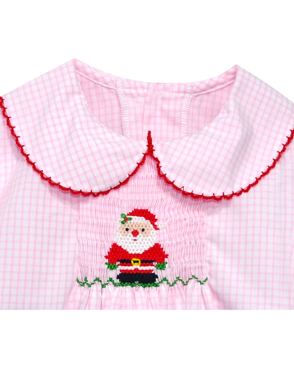 Pink checkered dress with embroidered Santa Claus on a white background