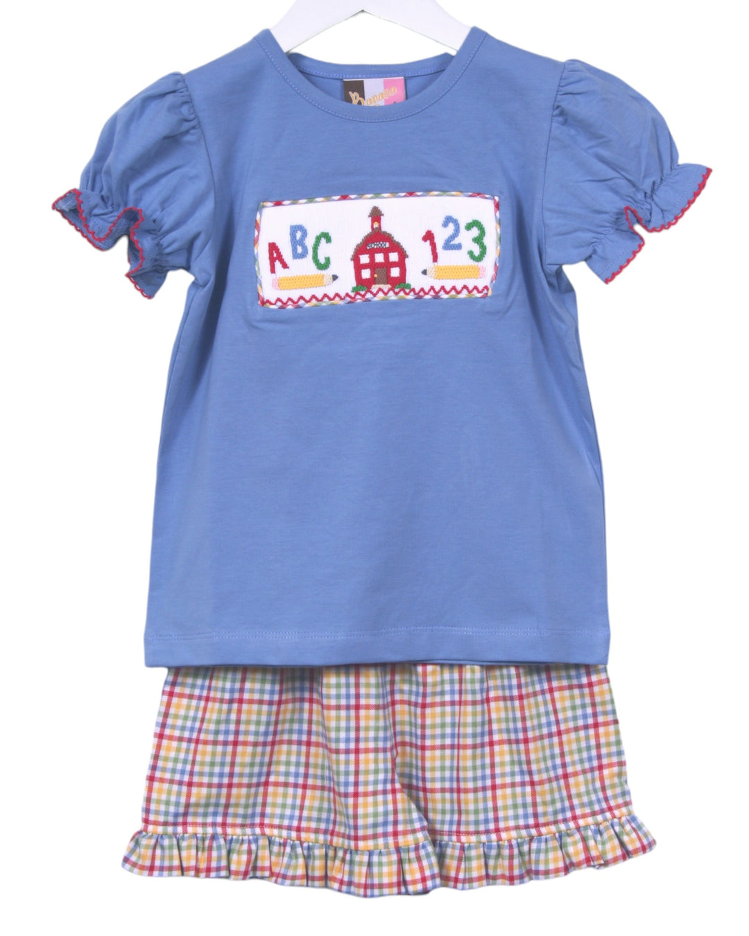 Children's blue top with colorful 'ABC 123' design and plaid shorts on a white background