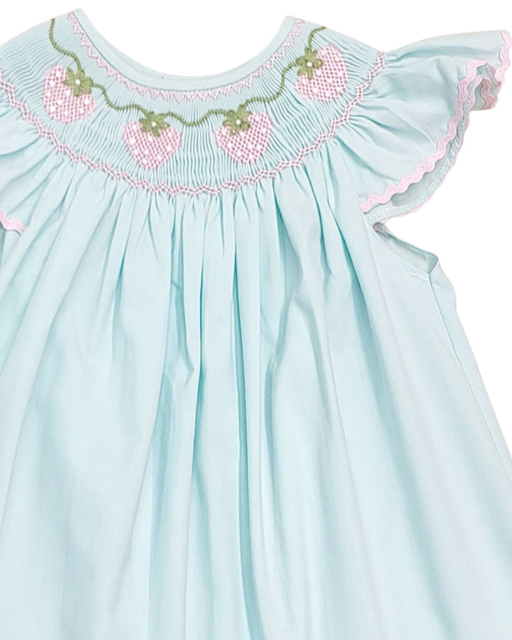 Light blue dress with embroidered details on a white background, that store