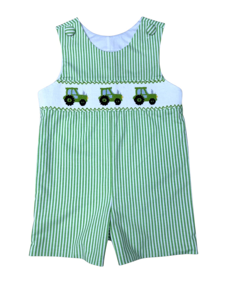 Green striped overalls with tractor design on a white background
