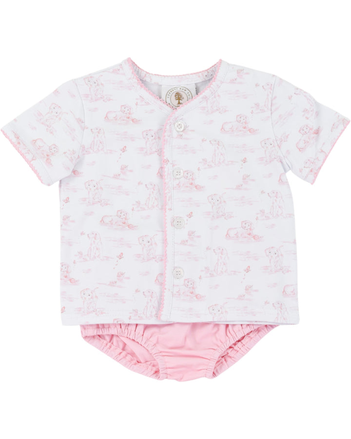 Baby outfit with pink floral shirt and matching bloomers on a white background