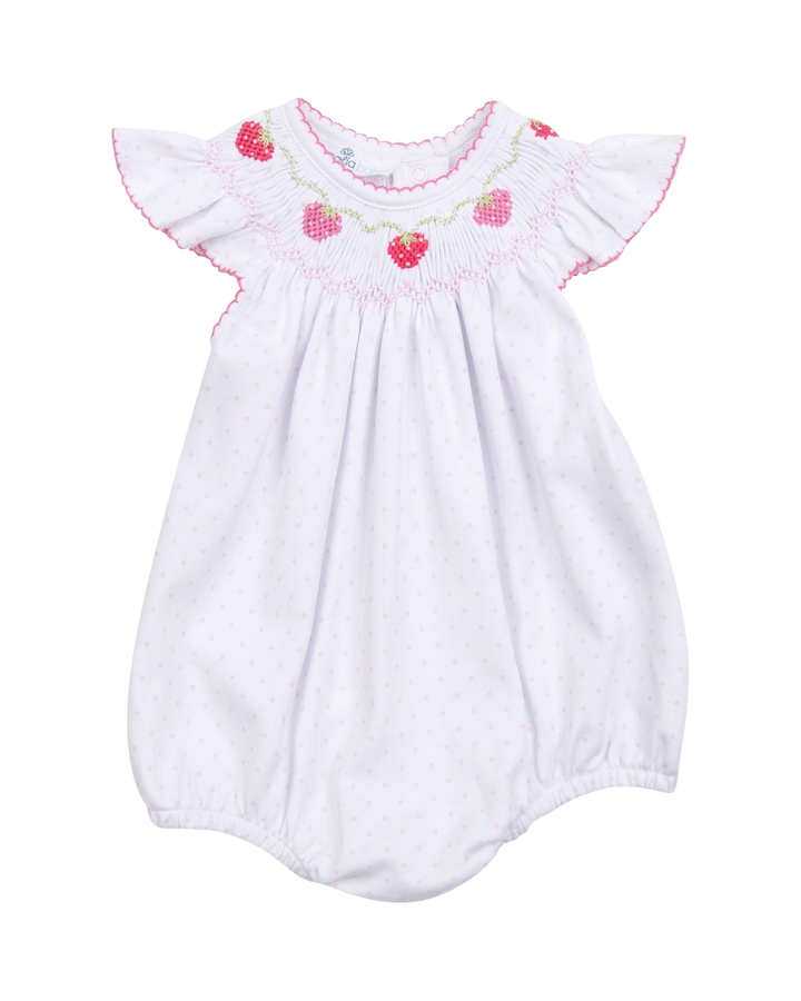 White baby romper with pink floral smocking on a white background