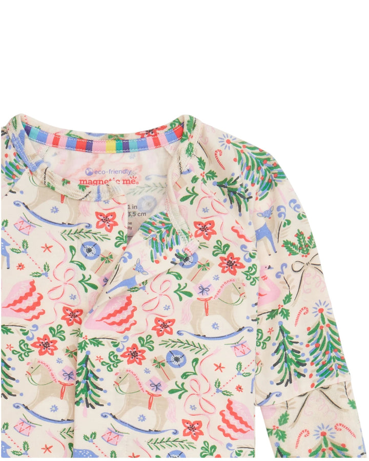 Children's long-sleeve shirt with colorful animal and floral pattern on a white background