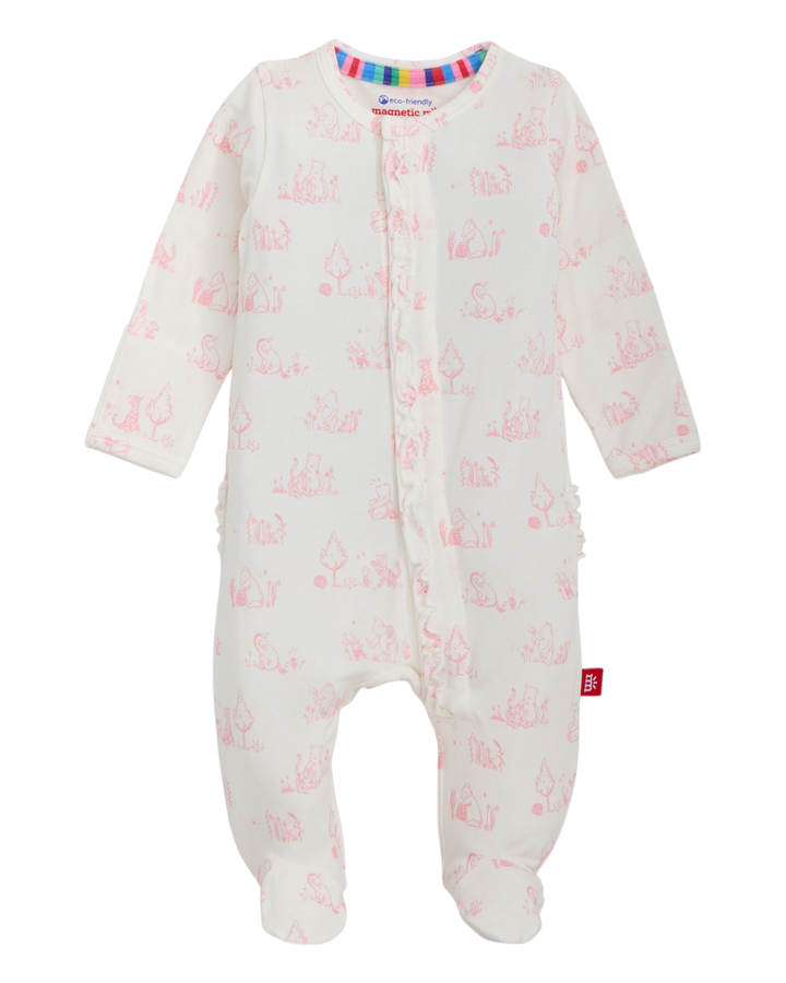 Baby onesie with pink animal pattern on a white background