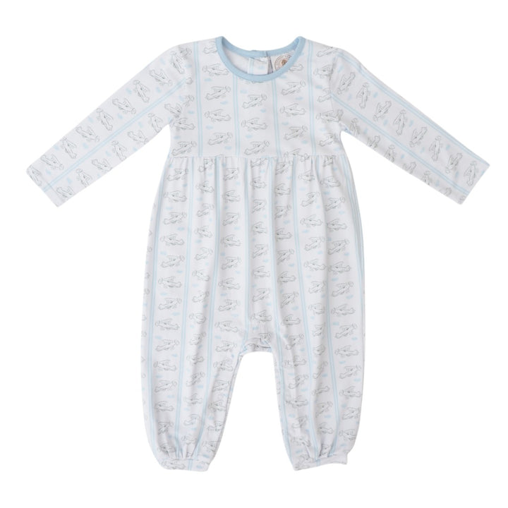 A baby long-sleeve footless one-piece jumpsuit in white with a light blue trim and an all-over light gray bunny print, shown flat on a white background, that store