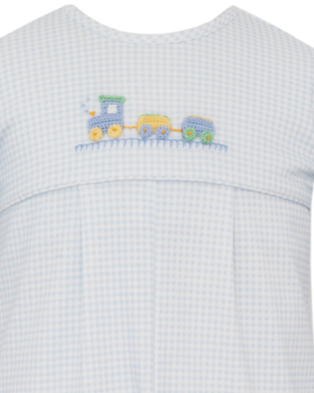 Baby outfit with embroidered train design on a white background