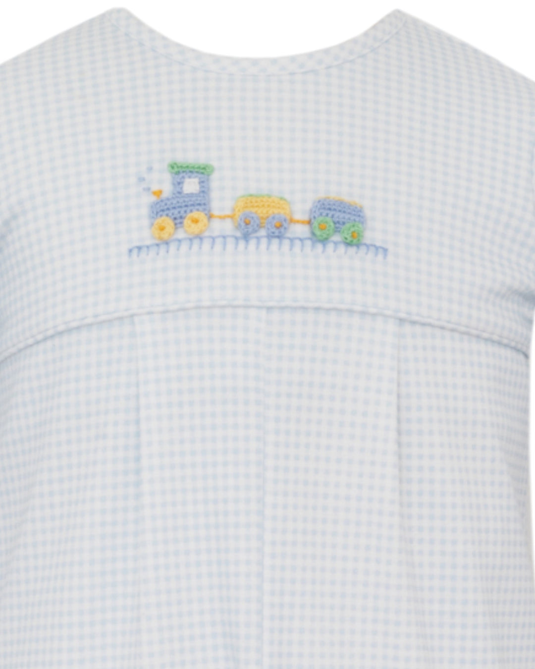 Baby outfit with embroidered train design on a white background